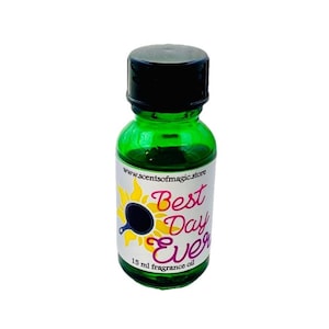 May include: A green glass bottle with a black lid and a white label that says "Best Day Ever" and "15 ml fragrance oil". The label also has a yellow sunflower with a black circle in the center.