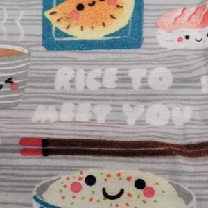 Glückliche Sushi-Kätzchen-Unterlage