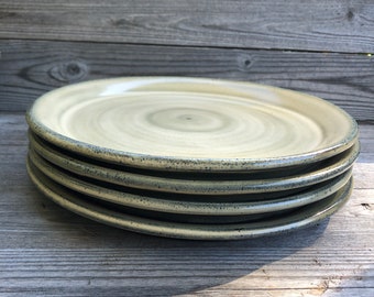 Four Pottery Dinner Plates on dark clay made to order