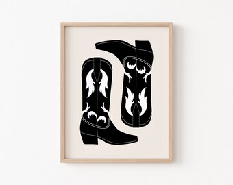 Könnte beinhalten: Ein druckbarer Kunstdruck mit einer Schwarzweißillustration von zwei Cowboystiefeln mit floralem Design.