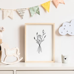 May include: A white wooden rocking horse, a white ceramic bear planter, and a framed black and white line drawing of flowers are displayed on a white dresser with a white cloud-shaped light fixture on the wall behind them. A white stuffed animal is in a woven basket.