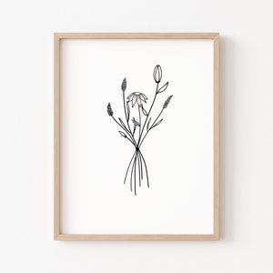 May include: A black and white line drawing of a bouquet of wildflowers in a simple frame. The flowers include a daisy, a tulip, and some grasses.