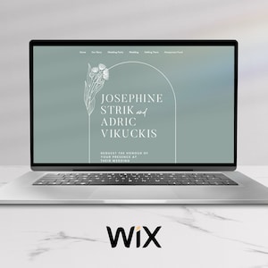 May include: A laptop computer displaying a wedding website with a light blue background and white text. The website features a floral design and the names "Josephine Strik and Adric Vikuckis". The text "Request the honour of your presence at their wedding" is also displayed.