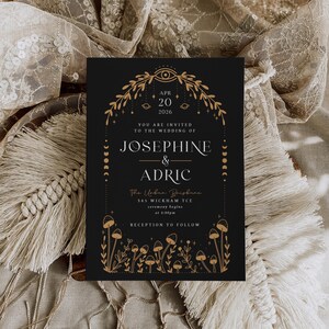 mystical woodland wedding invitation with celestial symbols and mushroom illustrations