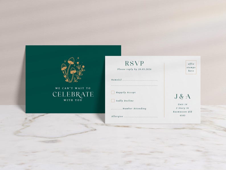 May include: Two-piece wedding stationery set. One card is dark teal with gold mushroom illustration and text "We can't wait to celebrate with you." The other is a white RSVP card with fill-in fields and "RSVP" text.