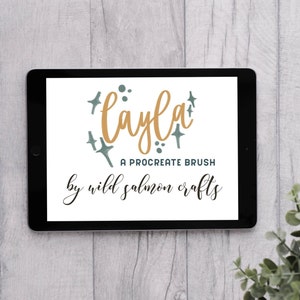 May include: A digital tablet displaying a graphic design for a Procreate brush called "Layla" by Wild Salmon Crafts. The design features the word "Layla" in gold lettering with a teal starburst design.