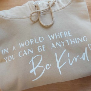 In A World Where You Can Be Anything Be Kind Hoodie | Women’s Slogan Top | Positivity Jumper | Mental Health Quote Sweater | Sweatshirt