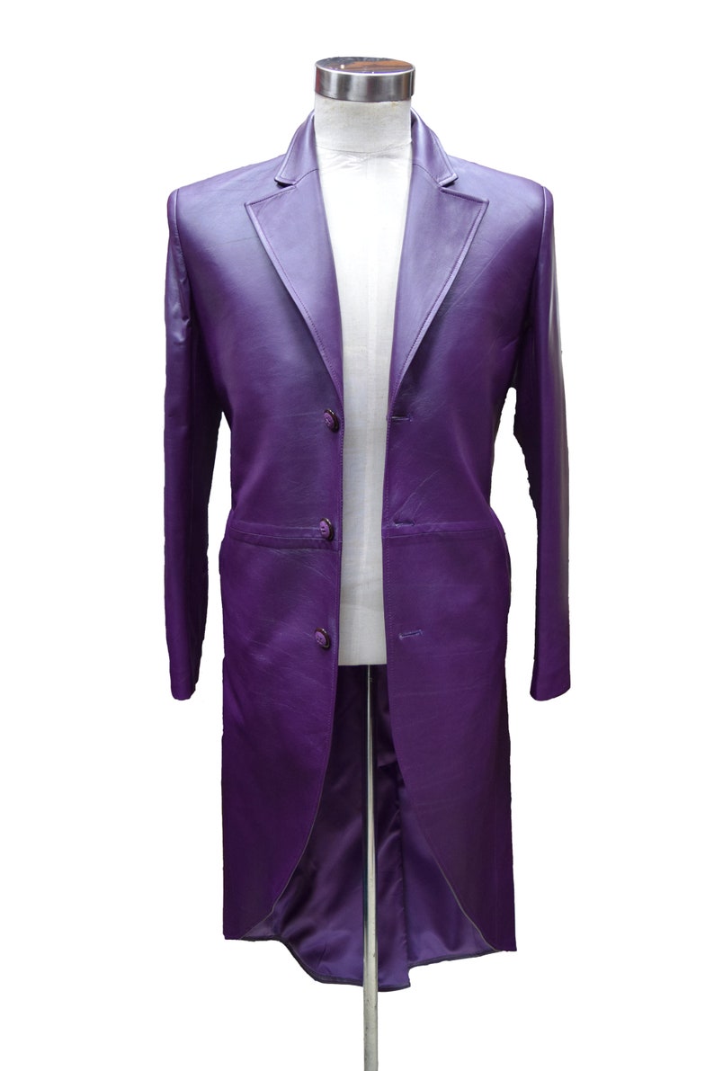 May include: A long, purple leather coat with a single-breasted closure and four buttons. The coat has a long, pointed collar and a tailored fit.