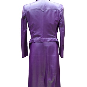 May include: A long, purple leather coat with a belt and a pointed collar.