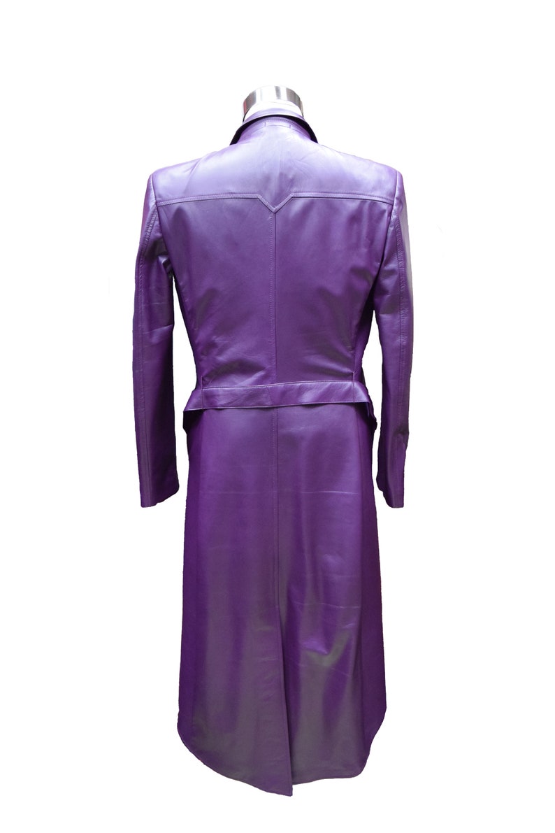 May include: A long, purple leather coat with a belt and a pointed collar.