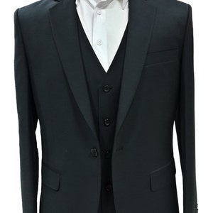 May include: A black three-piece suit displayed on a mannequin. The suit includes a jacket, vest, and dress shirt. The jacket has two front pockets and a notched lapel. The vest has a button-down closure. The white dress shirt is visible beneath the vest.