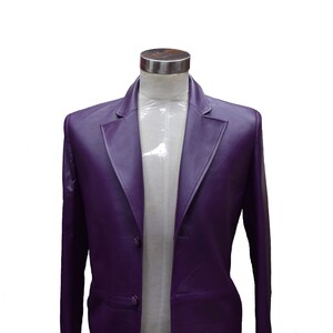 May include: A purple leather blazer with a single button closure and a classic lapel.