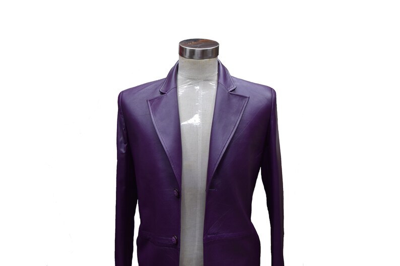 May include: A purple leather blazer with a single button closure and a classic lapel.