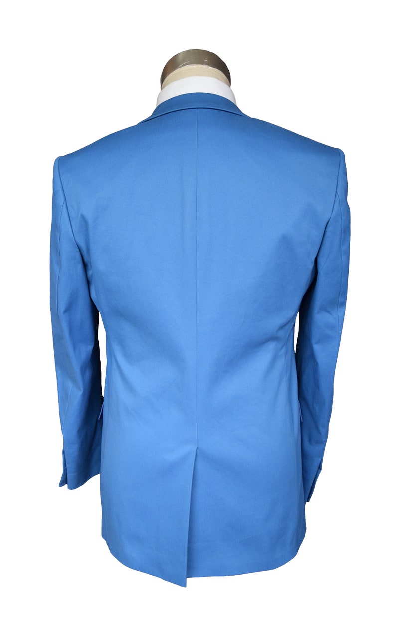 May include: A light blue blazer with a single back vent.