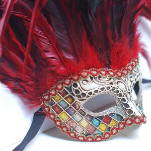 Maschera incas colombina con glitter e piume da donna