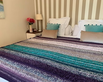 Afghan crochet blanket, vivid and warm color in purple, pink, green and brown tones. Made in a mixture of cozy wool and alpaca