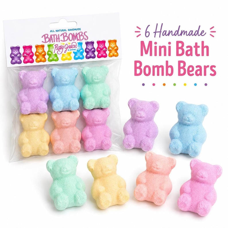A clear bag of six colorful bear bath bombs sits next to four loose bear bath bombs on a white surface.