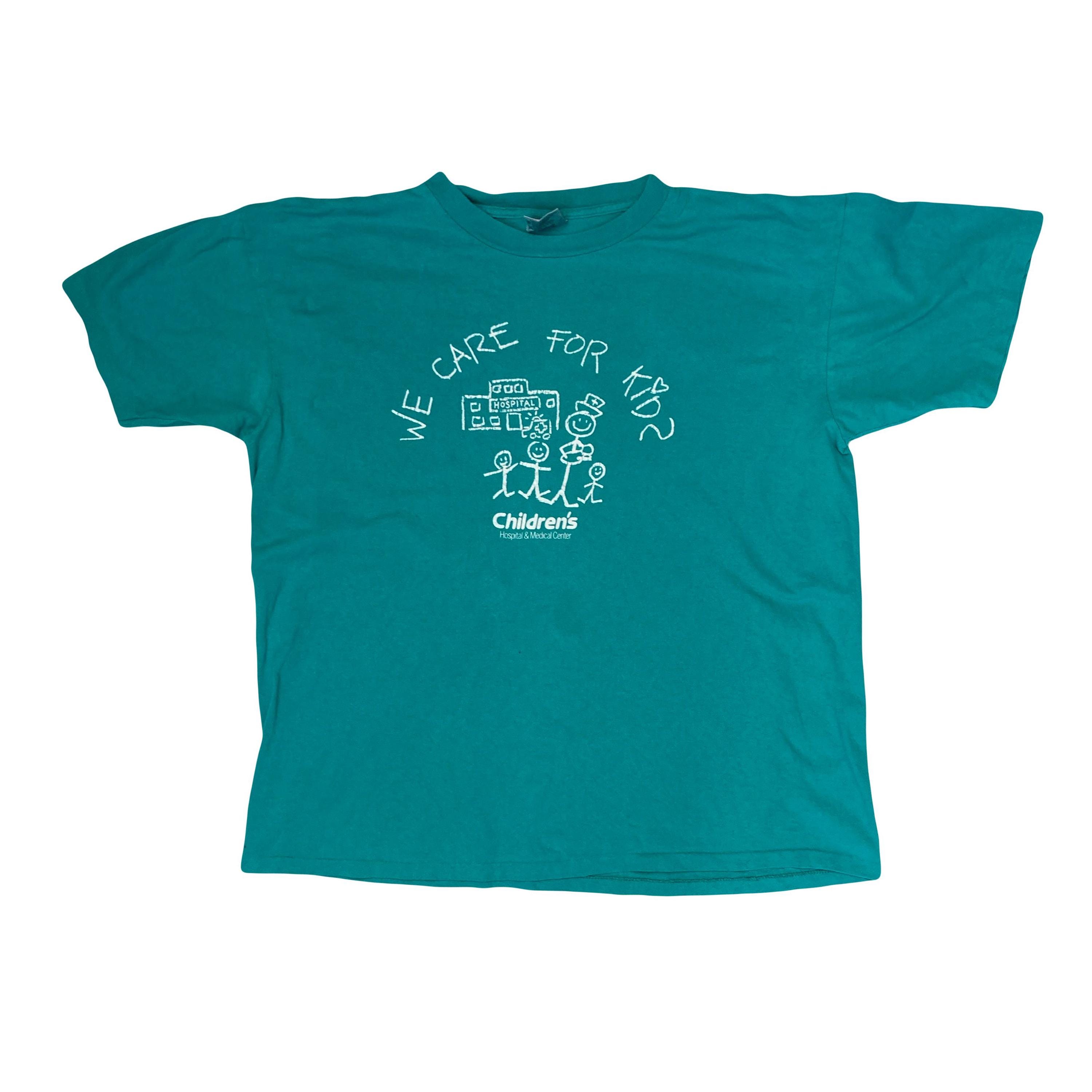 Vintage 90s Quirky We Care for Kids Single Stitch Turquoise T