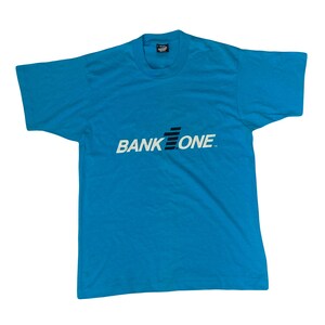 Maglietta vintage anni &#39;90 Bank One souvenir blu brillante con cucitura singola taglia grande di Screen Stars