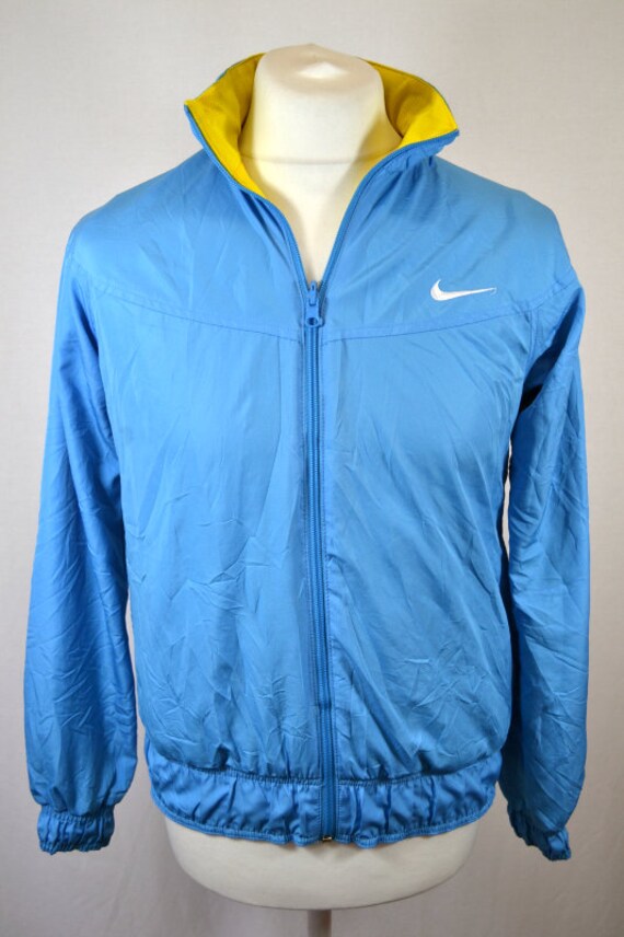 blue and yellow nike jacket