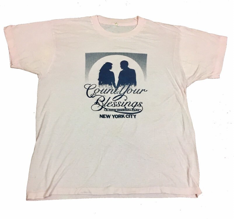 Image of Vintage 80S Count Your Blessings New York City Quirky Theatre Musical Usa Souvenir Light Pink Off White T Shirt Size Large