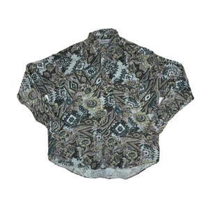 May include: A button-down shirt with a colorful, patterned design. The shirt features a mix of floral, geometric, and paisley motifs in shades of green, brown, and white. The shirt has long sleeves and a classic collar.