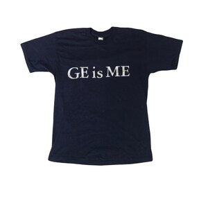 Vintage 90s quirky GE is ME souvenir USA navy blue promotional workers single stitch t-shirt size medium