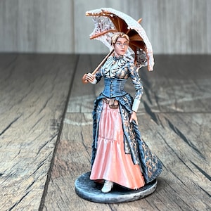 Figura de resina Menina com guarda-chuva. Brinquedo de fantasia em miniatura de mesa