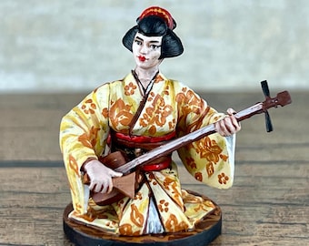 Hand-Painted Geisha Figurines: Elegant Resin Collectible