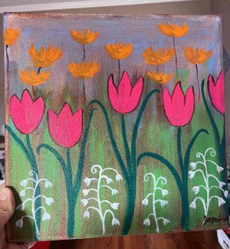 May include: A painting of a field of pink tulips with yellow flowers and white bell-shaped flowers. The background is a light blue with a hint of brown.