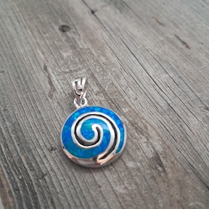 silver ancient greek spiral opal stone