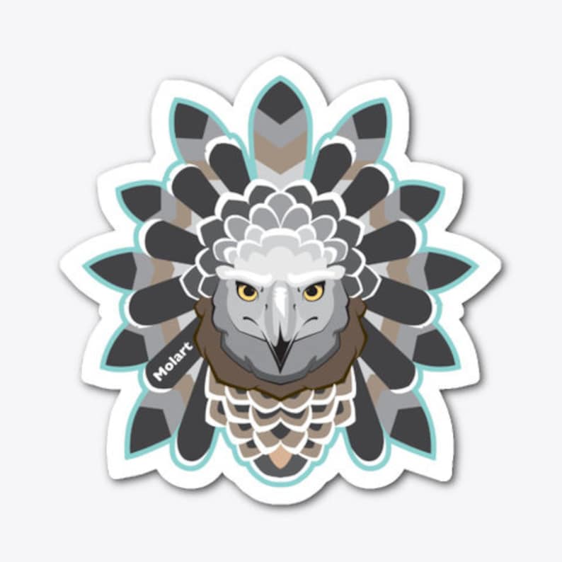 May include: A sticker featuring a stylized illustration of a bird of prey with a gray and white head and a brown body. The bird is surrounded by a pattern of black, gray, and brown feathers. The word "Molart" is printed in white on the sticker.