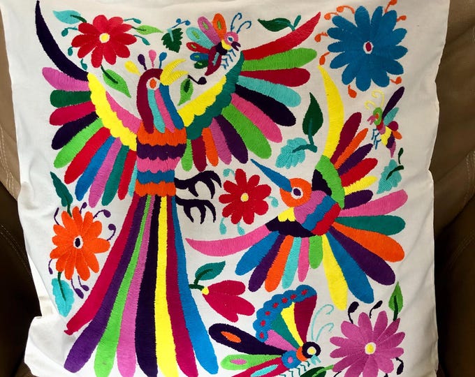 Otomi hand embroidered 19” x 19” pillow case with spirit animals and flowers.