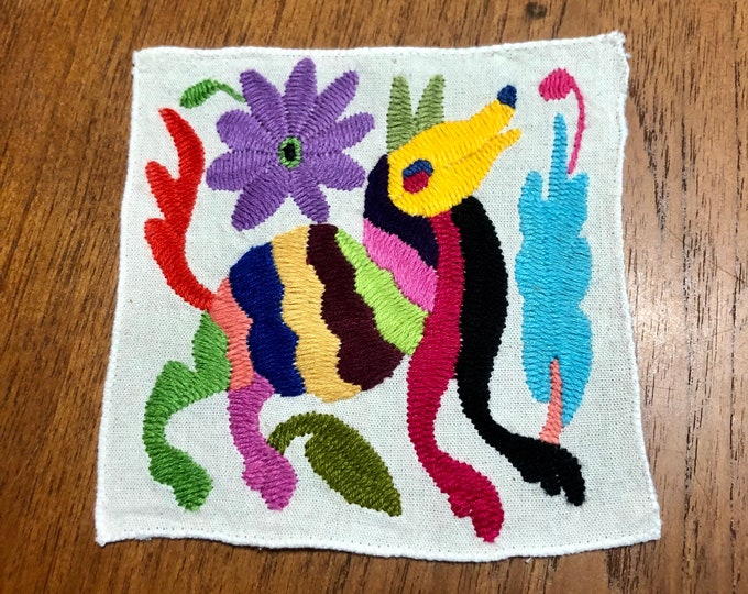 Otomi hand embroidered muslin coaster/cocktail napkin/frame-able art with multicolor spirit animal and flower design approx.  (5” x 5”)