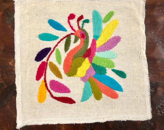 Otomi hand embroidered muslin coaster / cocktail napkin / frame-able art with multicolored bird and flowers.
