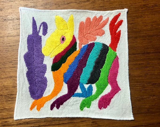 Otomi hand embroidered muslin coaster/cocktail napkin/frame-able art with multicolor spirit animal and flower design approx.  (5” x 5”)