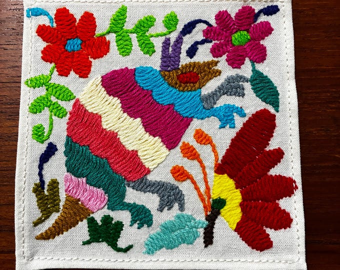 Otomi hand embroidered muslin cotton coaster / cocktail napkin / frame-able art with multicolored animal and flowers. (4 1/4” x 4 1/4”)