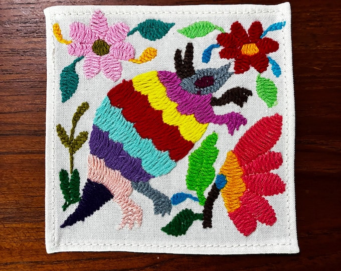 Otomi hand embroidered muslin cotton coaster / cocktail napkin / frame-able art with multicolored animal and flowers. (4 1/4” x 4 1/4”)