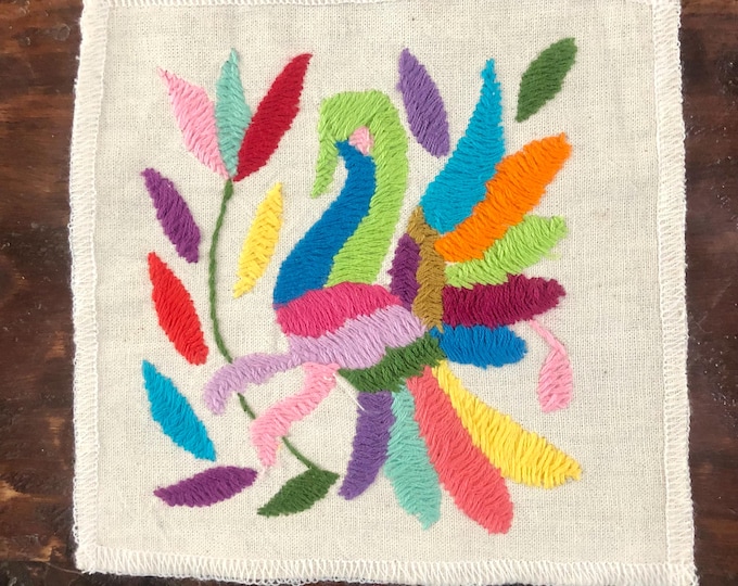 Otomi hand embroidered muslin coaster / cocktail napkin / frame-able art with multicolored bird and flowers.