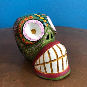 Alebrije Calavera Skull Handcrafted Wood Carving by Luis Garcia from Oaxaca, Mexico.