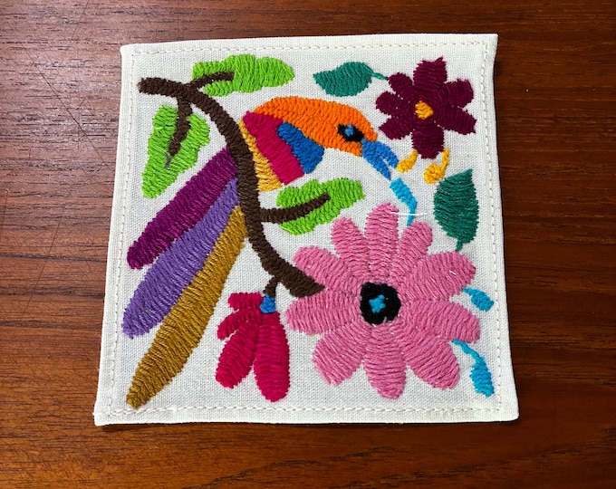 Otomi hand embroidered muslin cotton coaster / cocktail napkin / frame-able art with multicolored bird and flowers. (4 1/4” x 4 1/4”)