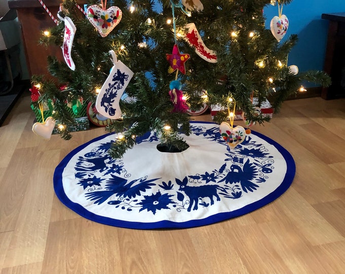 3’ diameter - Hand embroidered Otomi Christmas Tree Skirt on an off white muslin cotton with Blue embroidery and border from Hidalgo, Mexico