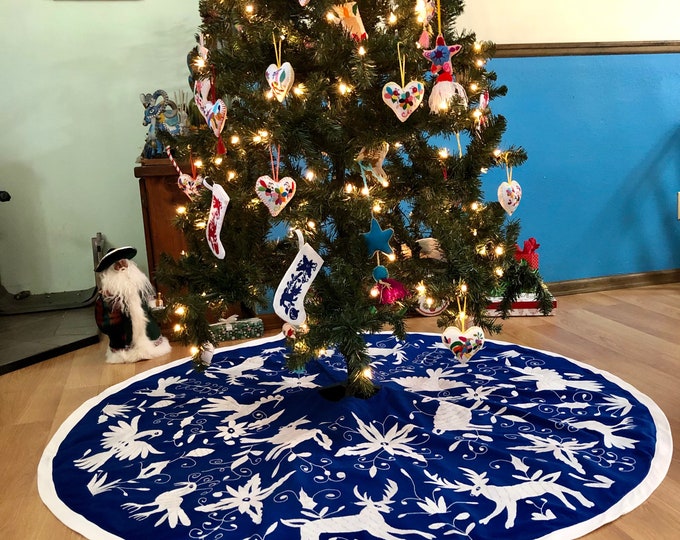 5’ Hand Embroidered Otomi Christmas Tree Skirt on beautiful blue muslin cotton with white border from Hidalgo, Mexico.