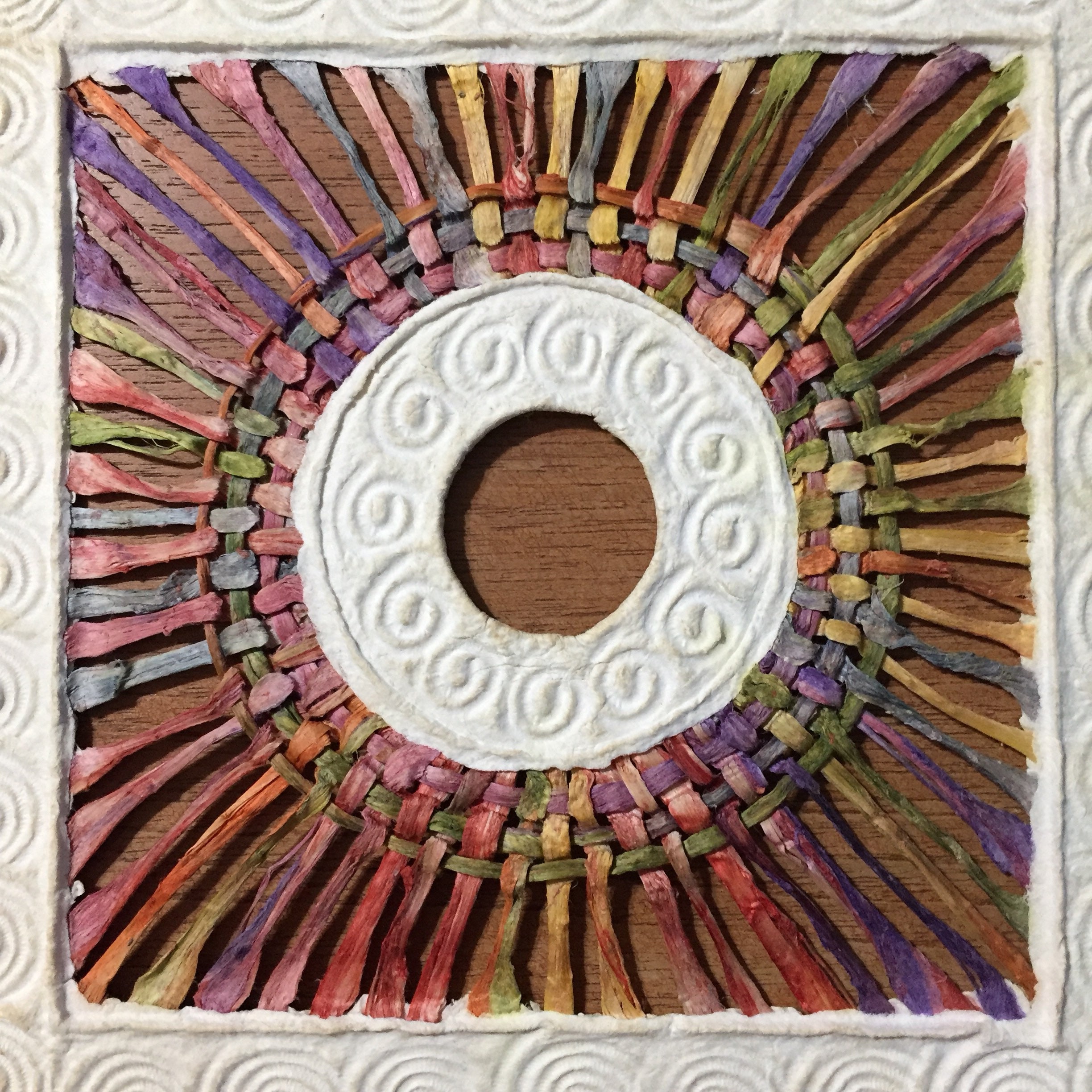 Handmade Amate Paper Wall Art with multicolor woven circle