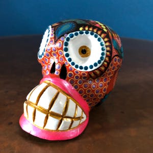 Alebrije Calavera Skull Handcrafted Wood Carving by Luis Garcia from Oaxaca, Mexico.
