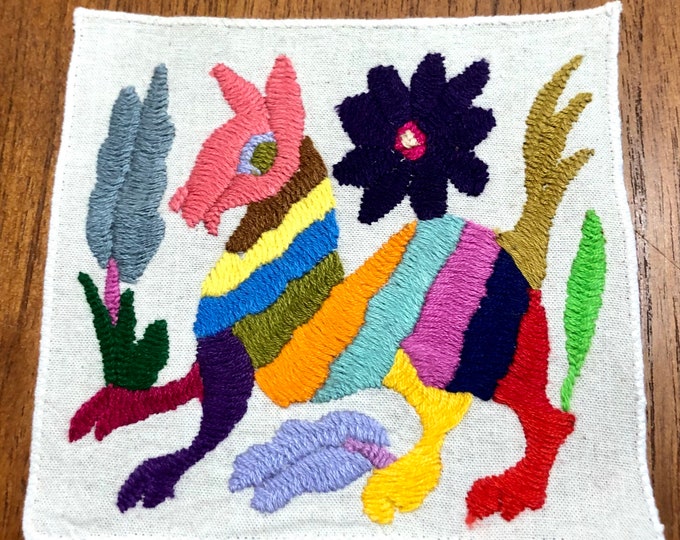 Otomi hand embroidered muslin coaster/cocktail napkin/frame-able art with multicolor spirit animal and flower design approx.  (5” x 5”)