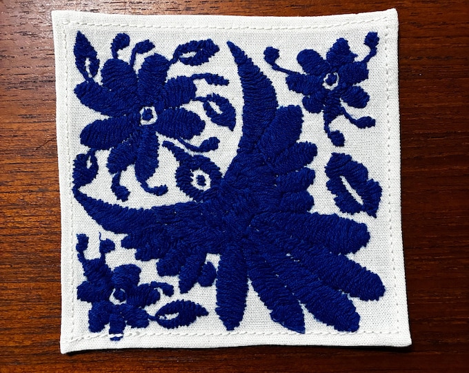 Otomi hand embroidered muslin cotton coaster / cocktail napkin / frame-able art with blue bird and flowers. (4 1/4” x 4 1/4”)