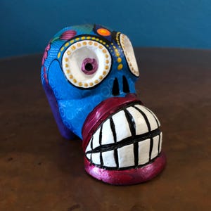 Alebrije Calavera Skull Handcrafted Wood Carving by Luis Garcia from Oaxaca, Mexico.