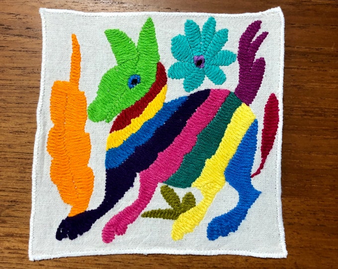 Otomi hand embroidered muslin coaster/cocktail napkin/frame-able art with multicolor spirit animal and flower design approx.  (5” x 5”)