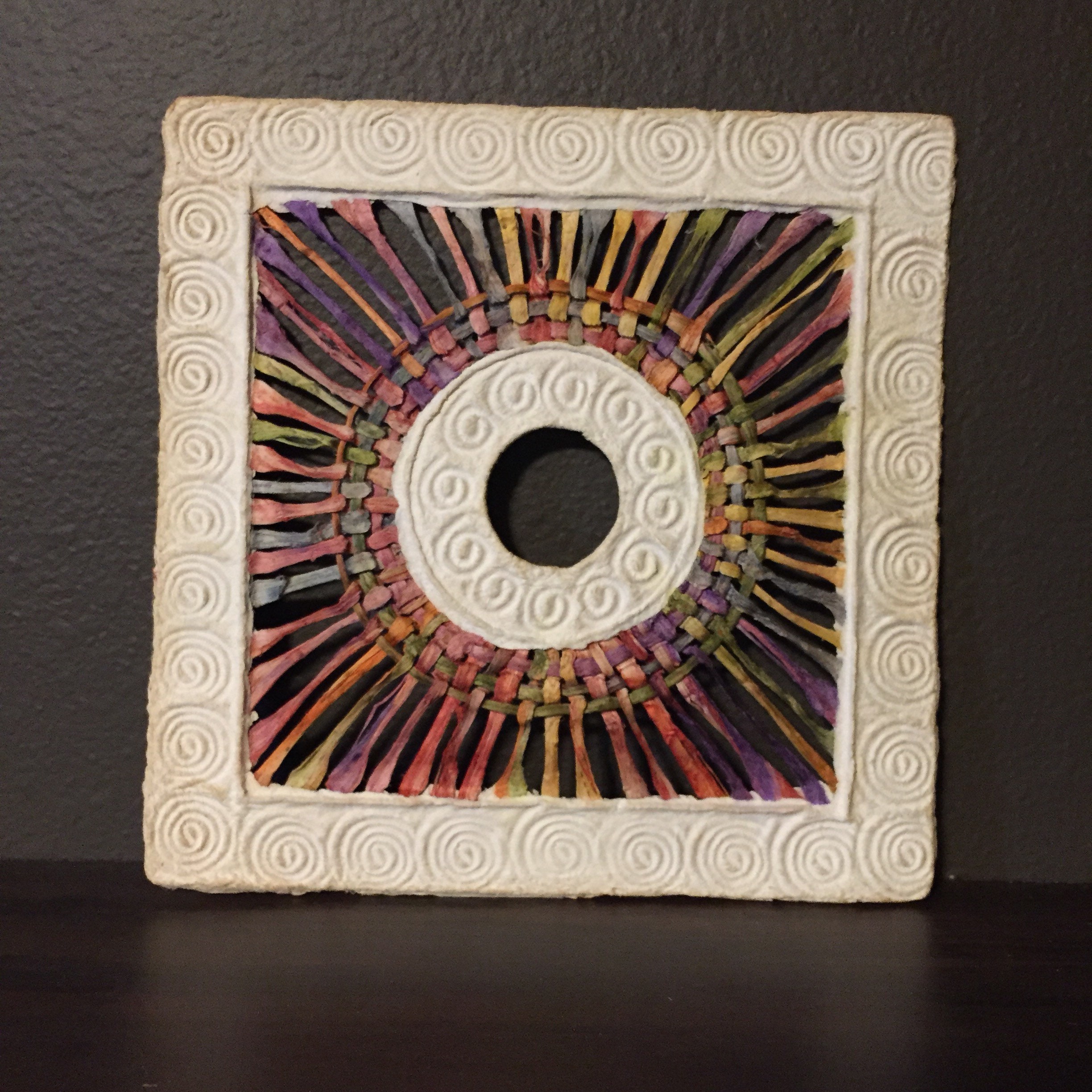 Handmade Amate Paper Wall Art with multicolor woven circle